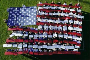 make-a-difference-day-human-flag-2002-faces